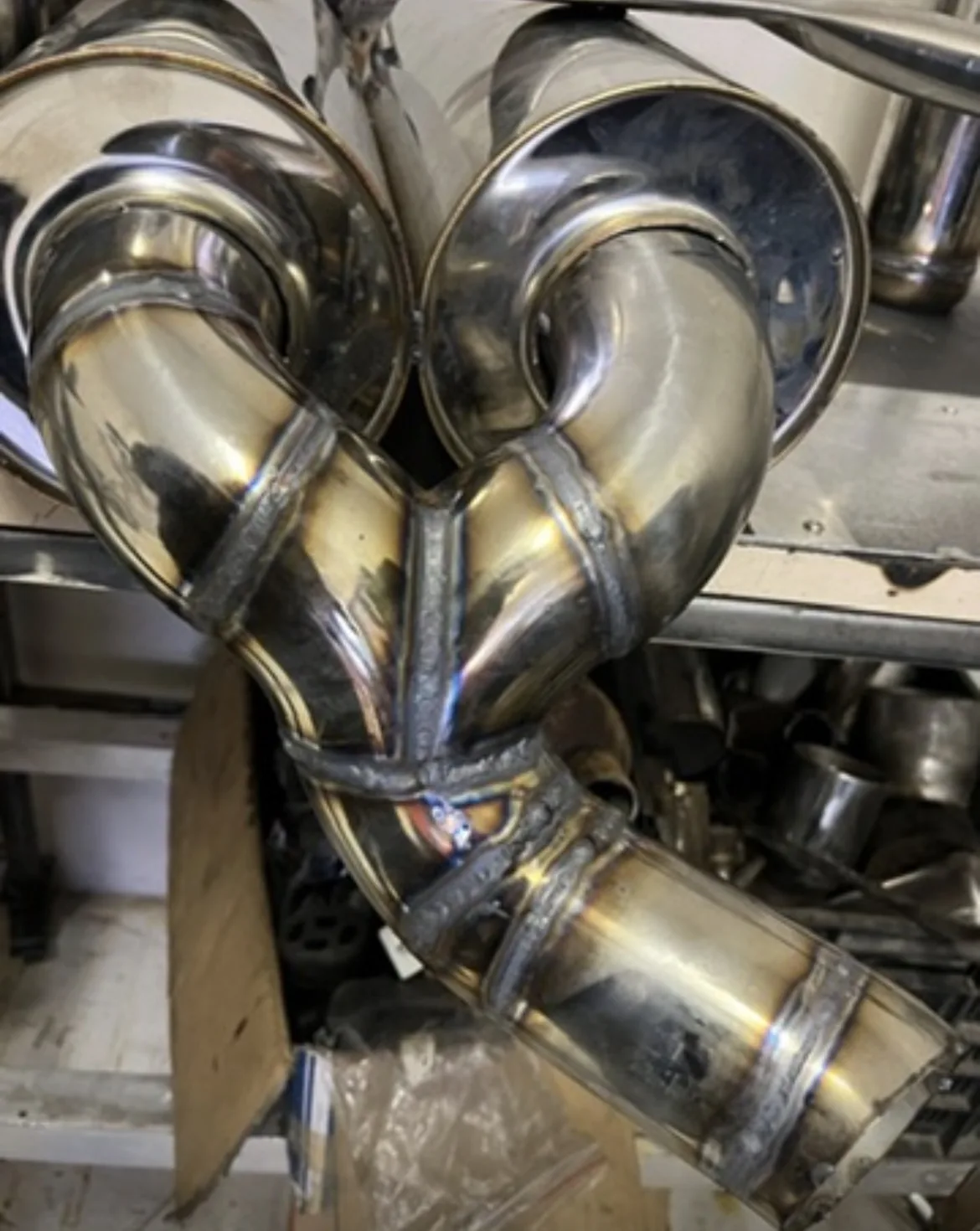 Close-up of fabricated stainless steel pipework with welded joints